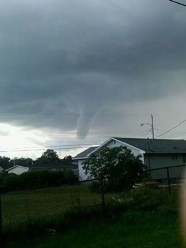Appears to be Funnel cloud forming in Glace Bay / Sydney Area Glace Bay, NS
