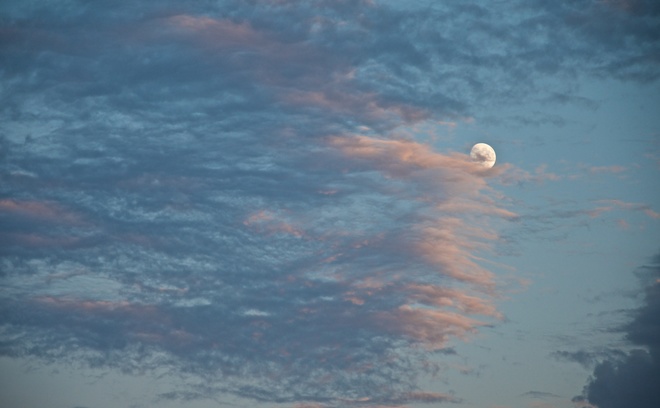 Moon Emerges from Ragged Sunset Clouds Edmonton, AB