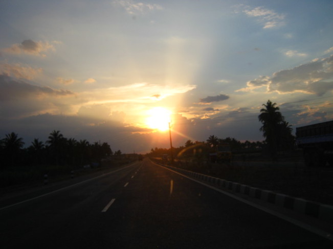 Sun set on a high way Madurai, Tamil Nadu, India
