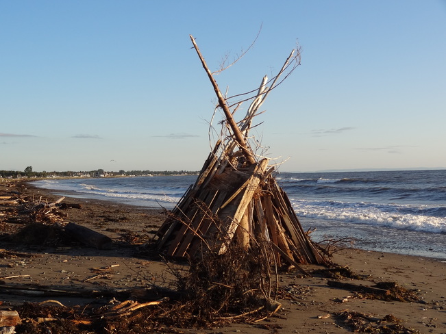 Preparing for a bonfire and after sunrise. Beresford, NB