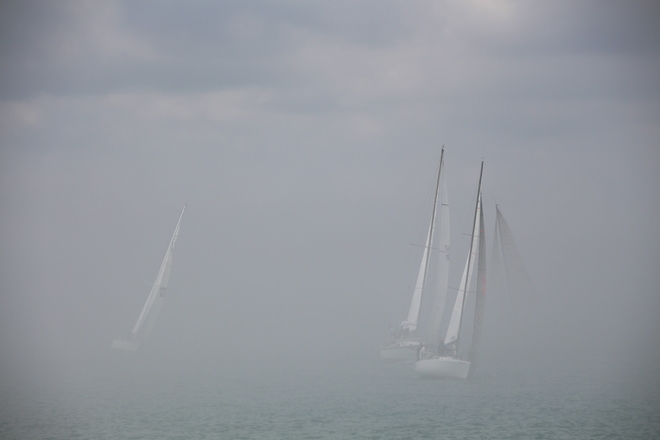 Fog over Lake St. Clair invades the Detroit River. Cannot see Windsor, Ontario! Bayview Yacht Club, Clairpointe Street, Detroit, MI, United States