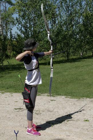 Practising for Canadian Archery Championships Argyle, MB