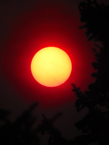 Sun and Moon through Washington Wildfire smoke Lethbridge, AB