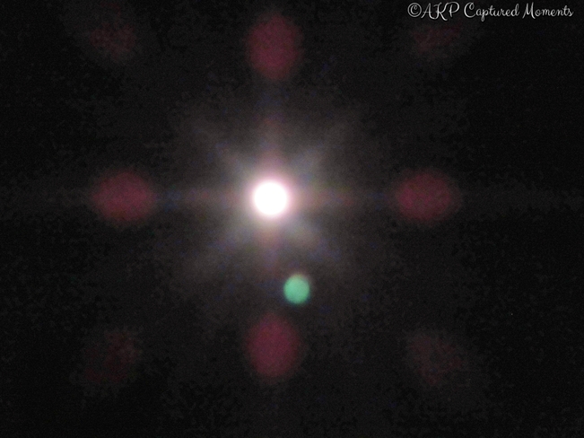 Moon with symmetrical cross radiation & orb Apsley, ON