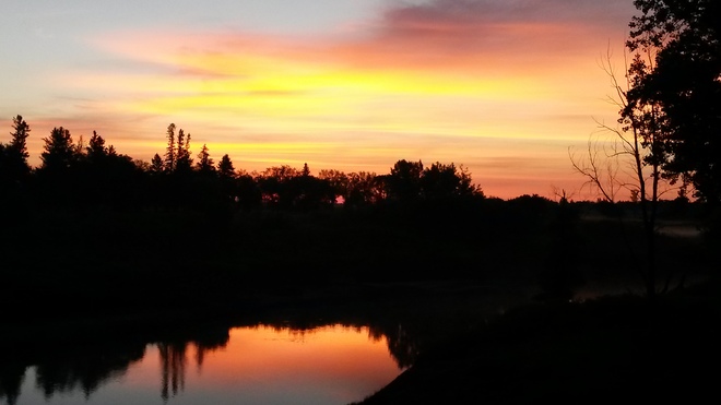 Sunset over the river Morris, Manitoba