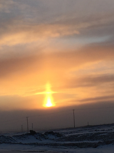 Light pillar at sunrise Calgary, Alberta, CA