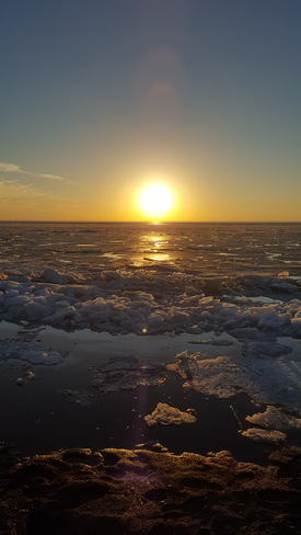 sunset over somewhat frozen lake erie Point Pelee, ON