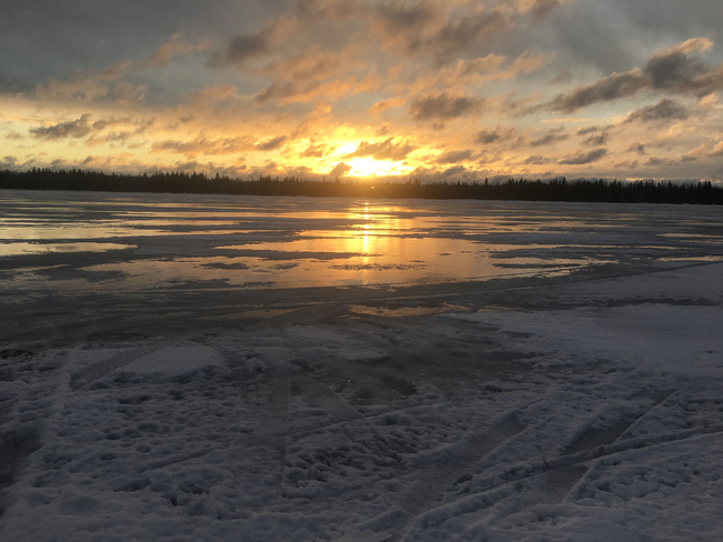 Turtle lake sunrise on ice Kivimaa-Moonlight Bay, Saskatchewan, CA