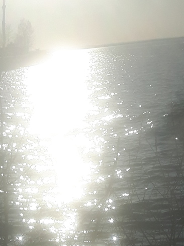 rayon de soleil sur le lac Mashteuiatsh, QC