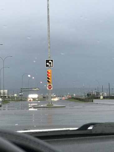 Left turning intersection Lights turned due to high wind Calgary, Alberta, CA