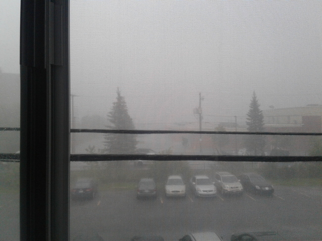 yesterday's rain, usually you can see a Harley Davidson sign Hull, QC