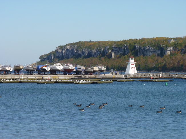 Lion's Head Lighthouse October 22, 2017, 25C and the inner harbour. Lion's Head Marina and harbour, Lion's Head Ontario