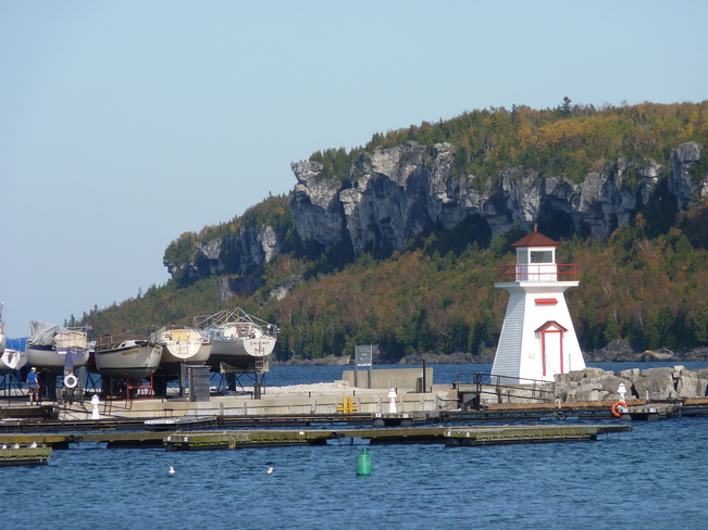 Lion's Head Lighthouse October 22, 2017, 25C and the inner harbour. Lion's Head Marina and harbour, Lion's Head Ontario