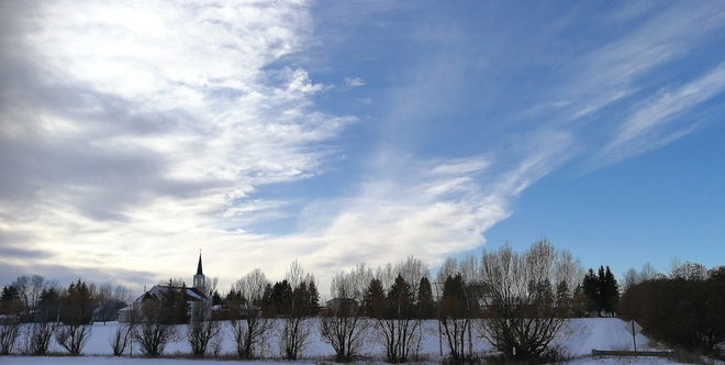 Clouds receading, blue sky coming St. Albert, AB