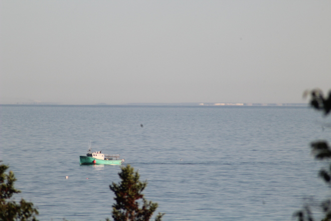See Saint John NB across the Bay of Fundy this morning Parkers Cove, Nova Scotia