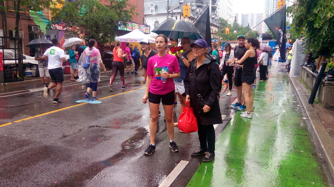 A Wet Pride Run in Toronto Wellesley Street East and Church Toronto, Ontario