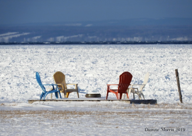 Acadien colors represented in these chairs overlooking the beautiful Chaleur Bay Anse-Bleue, New Brunswick