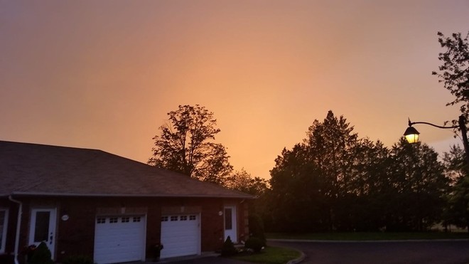 Orange/yellow glow at sunset tonight Cobourg, ON