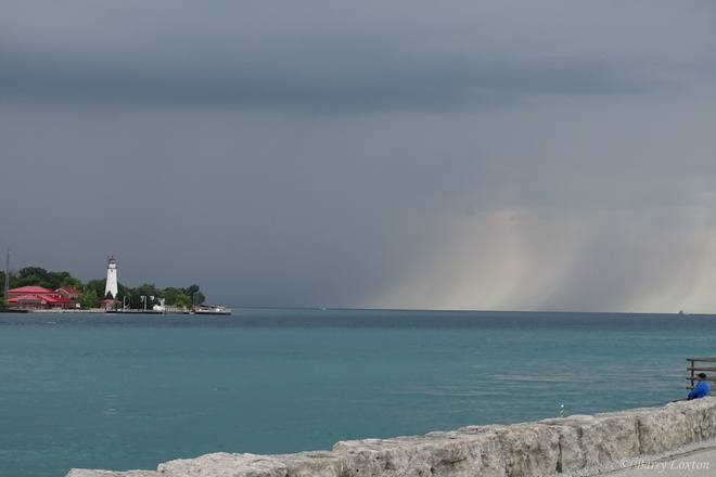 Storm clouds over Lake Huron and the St. Clair River Point Edward, ON