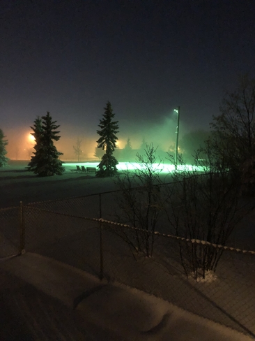 -48 with then wind chill the outside rink looks illuminated Grande Prairie, Alberta, CA