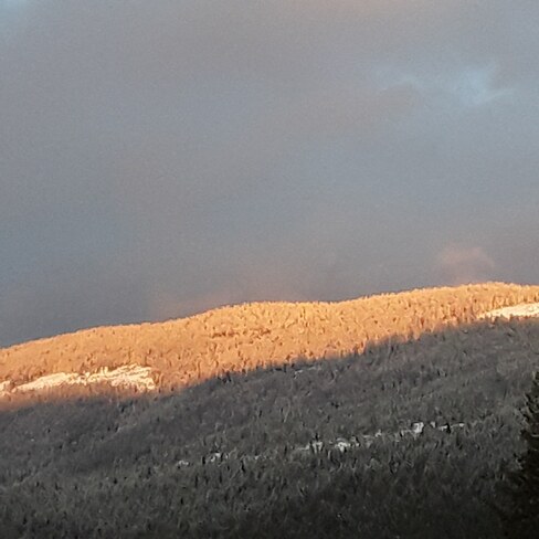 Sunset over Owl Head mountain in Sicamous, fresh snow Sicamous, BC