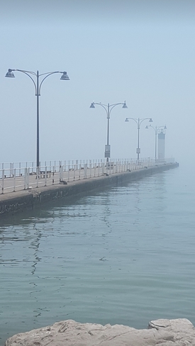 Oshawa Pier shrouded by early morning fog Oshawa, ON
