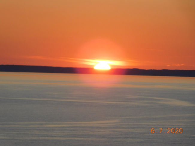 Summer sunset at Long Eddy Light. Grand Manan Island, Grand Manan, NB