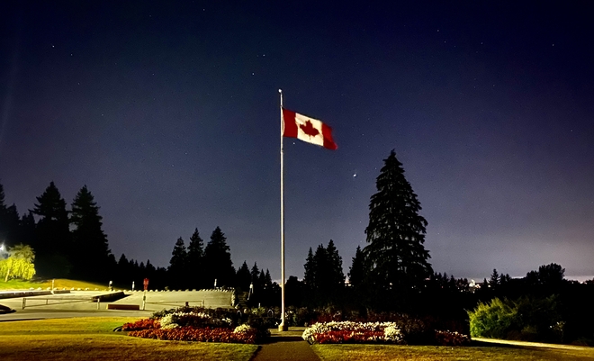 Canada Flag Flying at Night Burnaby, British Columbia, CA