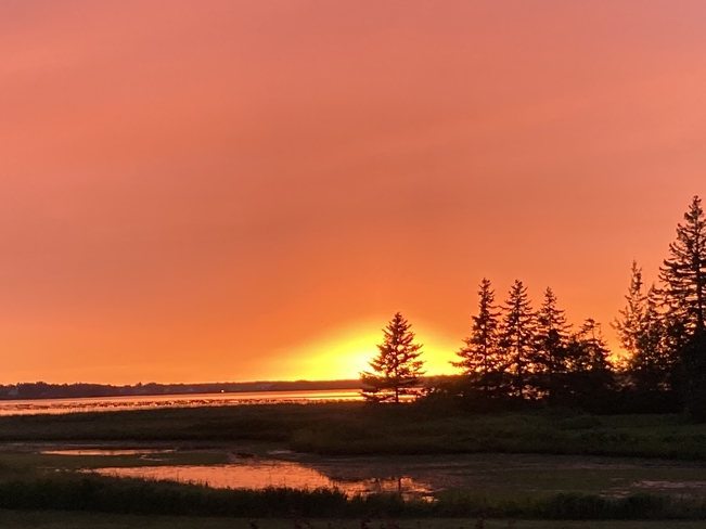 Smoky sunset Grande-Digue, New Brunswick, CA