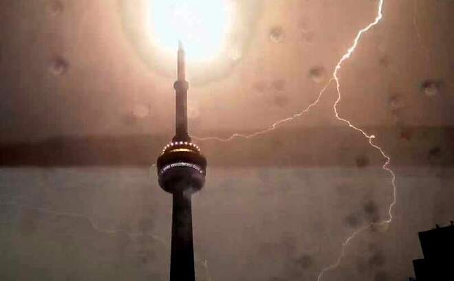 lightning hitting C.N.Tower 10-14 -20 120 Centre Island Dock, Toronto, ON M5J 2E9, Canada