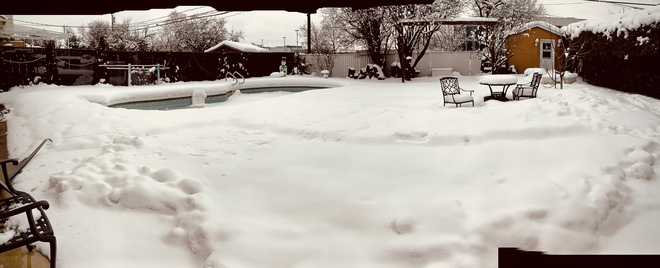 Snow covered backyard Longueuil, QC
