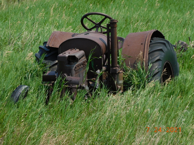 Pioneer Saskatchewan Farm Tractor lost in time. Minton, Saskatchewan