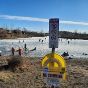 Sign says no swimming or skating!