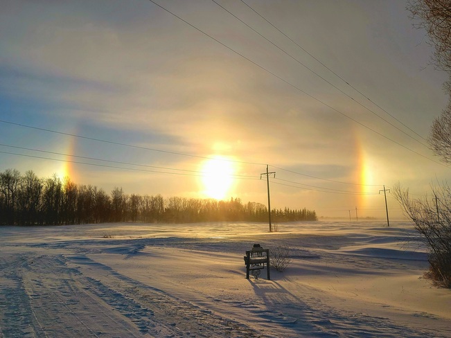 Sun dogs in the storm so excited they made rainbows this time Hoop and Holler Bend, MB