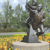 Statue Amongst The Tulips