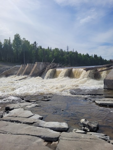 lots of water still coming over the black sturgeon dam Red Rock, ON