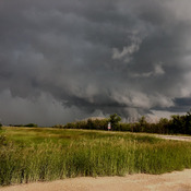 Supercell Wall Cloud forming "fingers" 4km northeast of Stonewall, MB