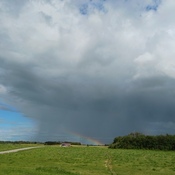 rainbow and rain/cloud
