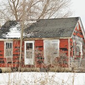 abandoned house in snow