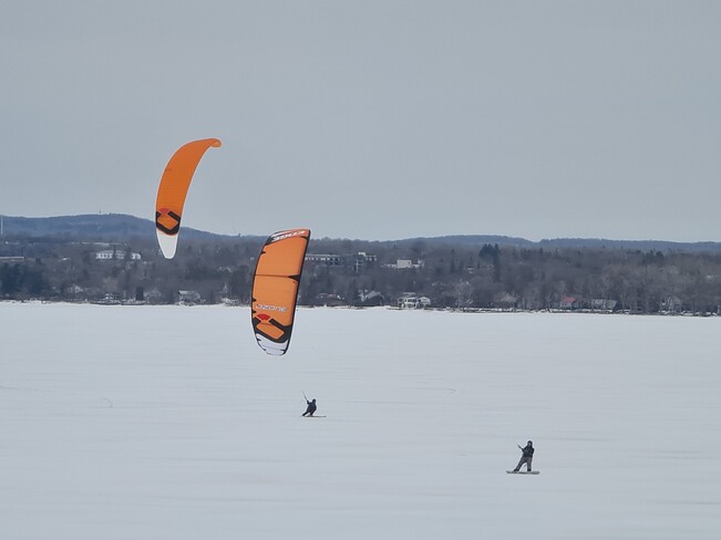 Tandem kite boarders on the Ottawa River Ottawa, ON