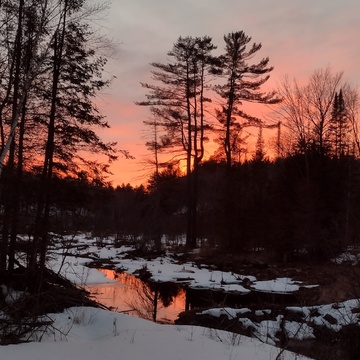 a sunset at devils lake