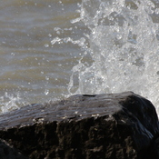 waves crashing against the rocks