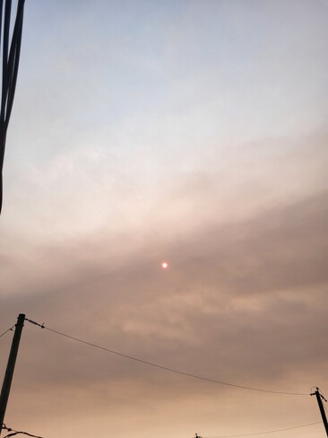 le soleil a travers les nuages et le smog Cap-de-la-Madeleine, QC