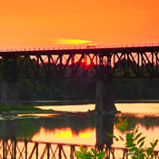 Sunset With Train On The Trestle