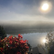 Misty morning over Caddy Lake in Manitoba
