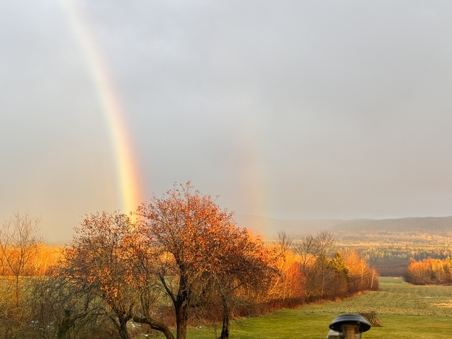 Rainbow after a short storm Maple Ridge, New Brunswick, CA