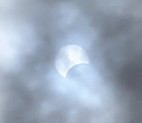 Eclipse through the Clouds Guelph, ON