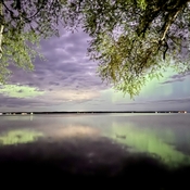 Aurora’s with reflection over Lake Simcoe