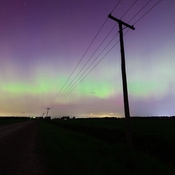 Telephone lines in the northern-lights