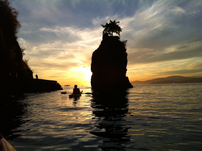 Kayaking around Siwash Rock Vancouver, British Columbia Canada